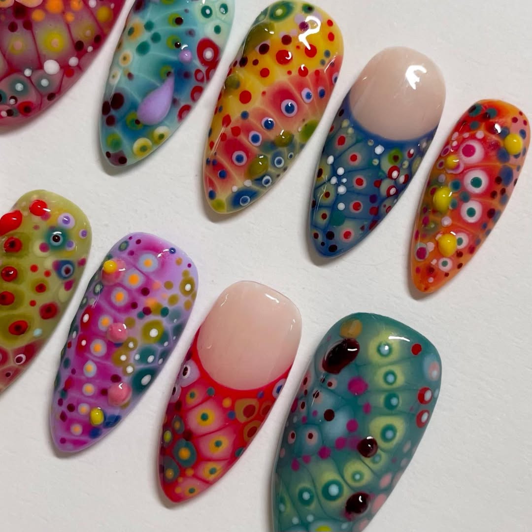 Colorful nail art designs on a white background