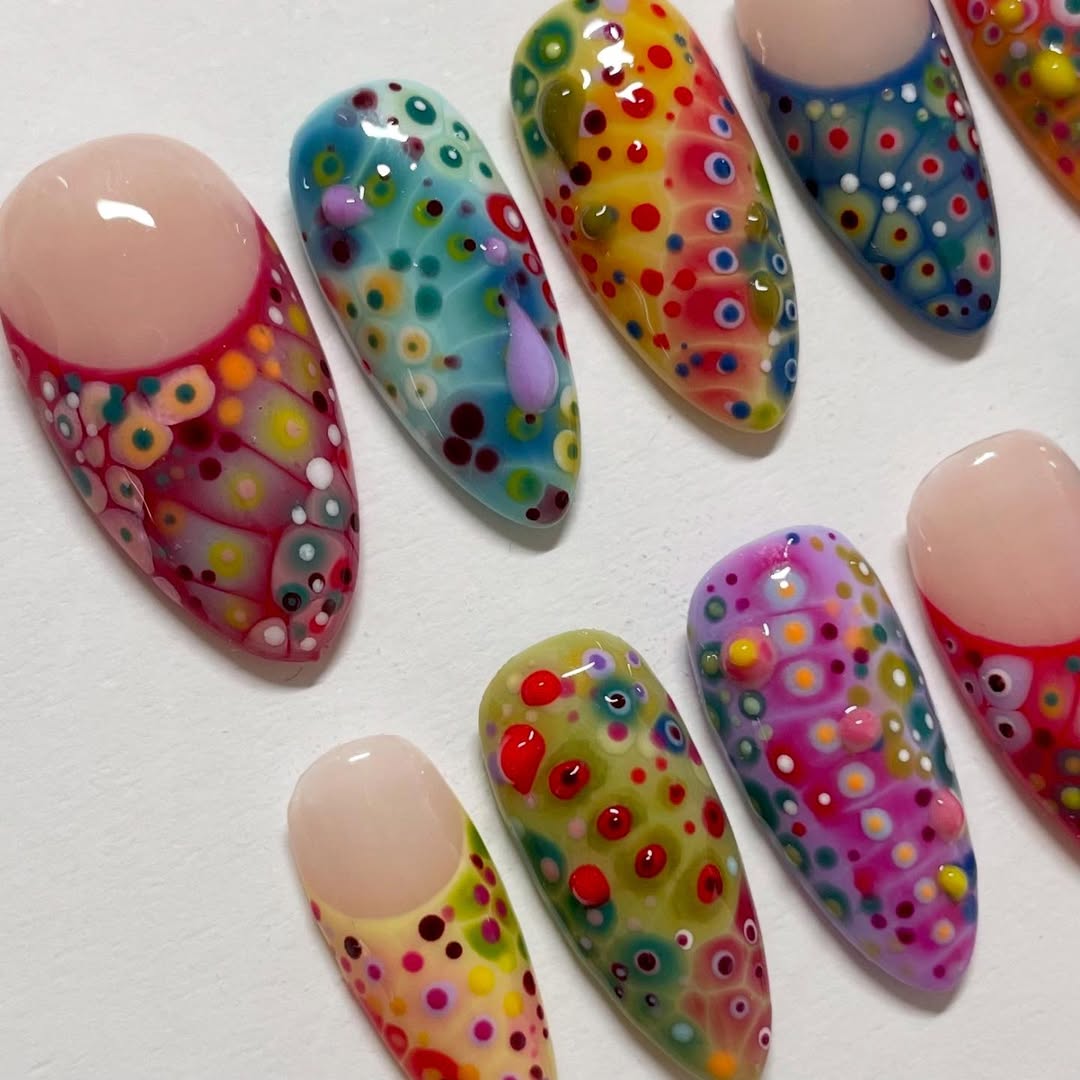 Colorful nail art designs on a white background
