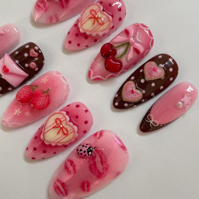 Decorative nail art designs on a white background