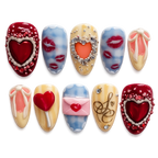 Decorative nail art with hearts and other designs on a white background