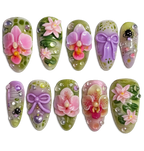 Decorative nail art designs with flowers and bows on a white background