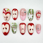 Set of apple nail art designs on a white background
