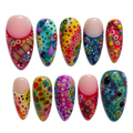 Set of colorful nail art designs on a white background