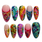 Set of colorful nail art designs on a white background