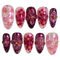 Set of decorative nail art with pink and purple flowers on a white background