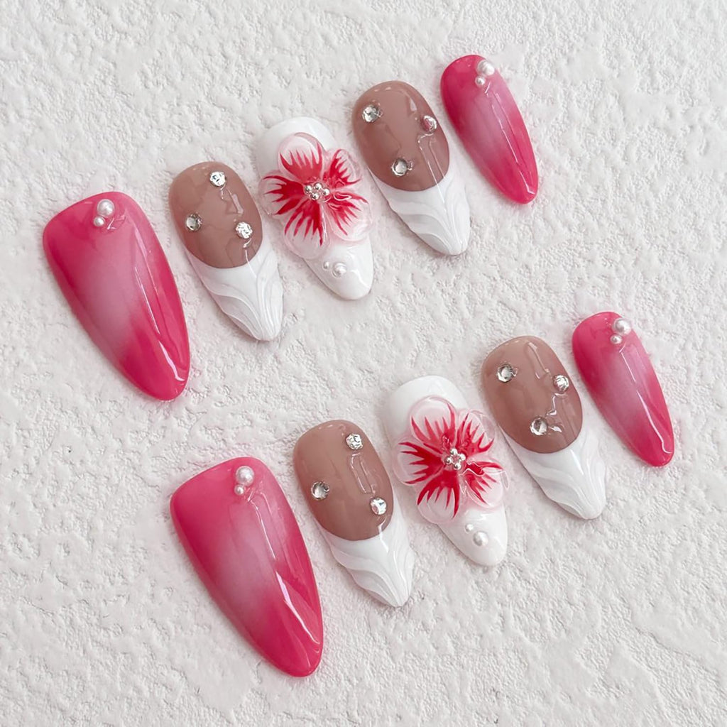 Set of nail art designs with pink, brown, and white colors on a textured white background