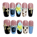 Set of nail art designs with various decorations on a white background