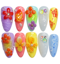 Set of colorful nail art designs on a white background